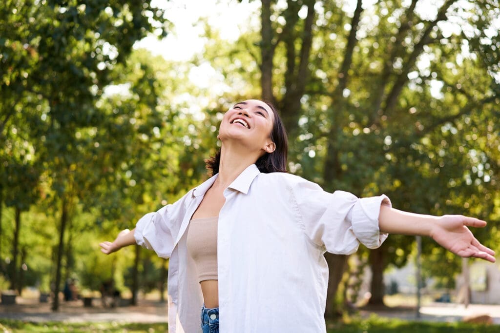 Woman dances in the forest