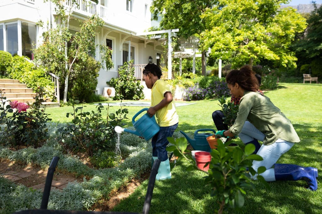 Family gardening together in Spring