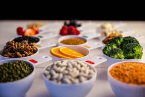 Healthy foods properly portioned into measuring cups.